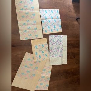 Vintage Baby Gift Wrap 2 patterns assorted sizes. Paper is yellow due to age.